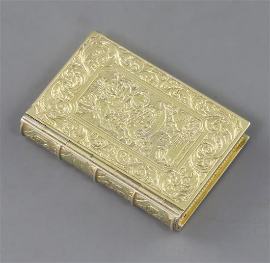 A Victorian silver gilt vinaigrette, modelled as a book, by Rawlings & Summers,